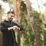 depositphotos_294441026-stock-photo-male-runner-using-smart-watch